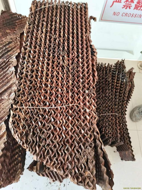 湿法脱硫塔这样的填料是不是选型很不合理 大家帮忙看下 有图 这是我们一个污泥焚烧项目脱硫洗涤塔拆出来的填料,不同于普通的鲍尔环或拉西环,是不是已经是落后的产品
